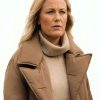 Shop Let’s Love 2026 Malin Akerman Brown Puffer Coat